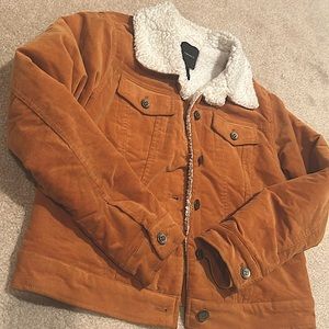 Fur lined auburn jean jacket.